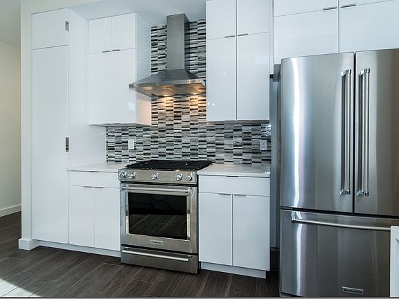 Gourmet Kitchens with waterfall countertop
