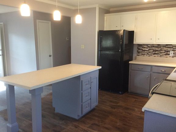 Center island open to living area. Perfect for gatheing family & friends!