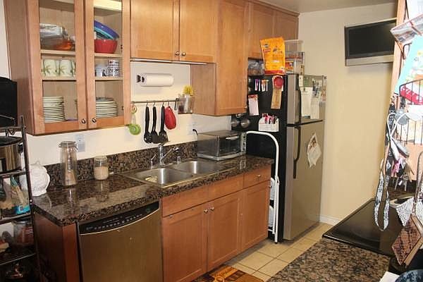 Kitchen with stainless steel appliances.
