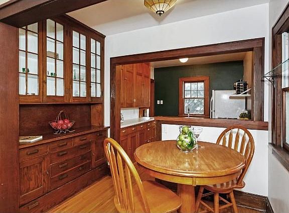 Beautiful, original built-in buffet is in excellent condition.