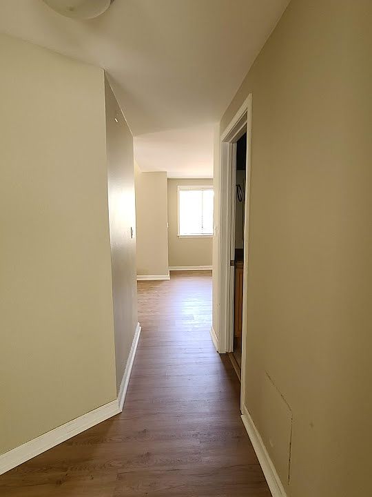 Hallway from bedrooms to bath and living area