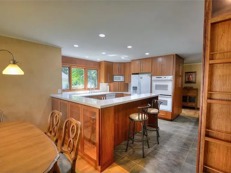 Large kitchen with dining areas