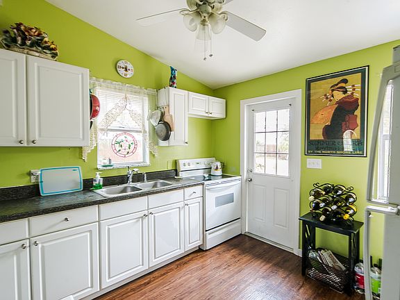 Fridge and stove appliances updated large sink (this is older pic)