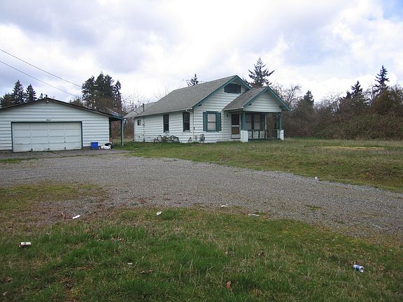 View of home and garage/shop