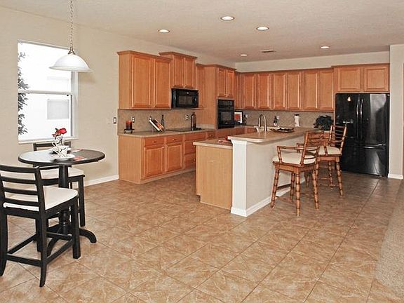 4th image of 2318 Wild Tamarind Blvd
