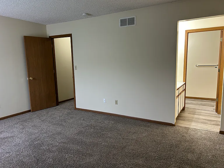 Master bedroom looking into bathroom