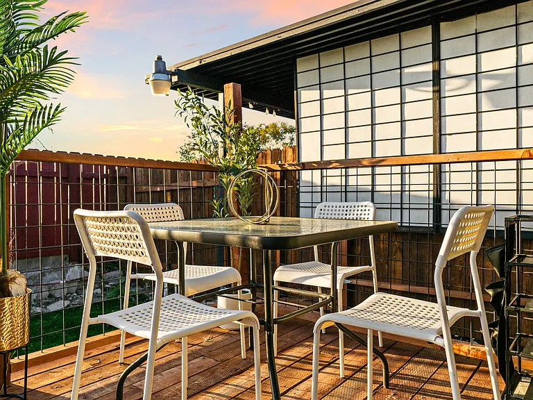 Cozy outdoor dining area, perfect for meals under the open sky.