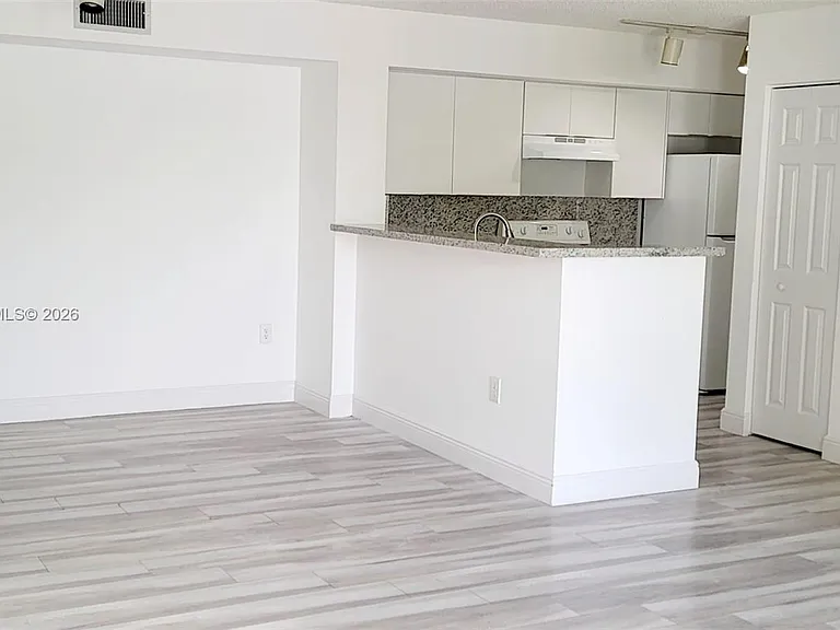 11155 SW 5th Pl #203 — Photo 13