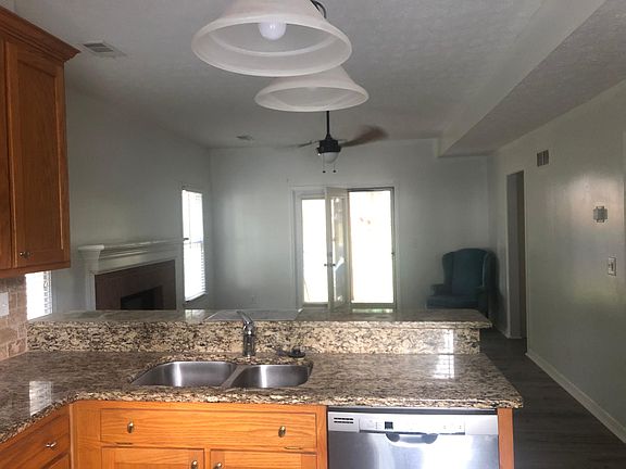 Kitchen overlooking living room.