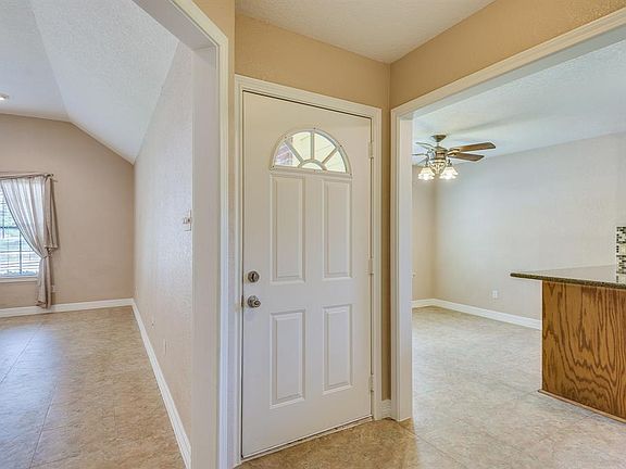 As you enter, the Kitchen/Dining will be immediately to the left and the Living Area to the right...