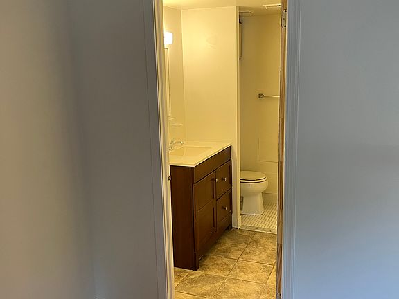 Master bath with closet.