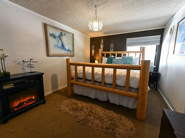 King Bed & Electric Fireplace