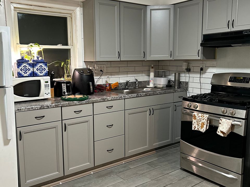 You can go inside to find the kitchen immediately to your left, with a welcoming layout.