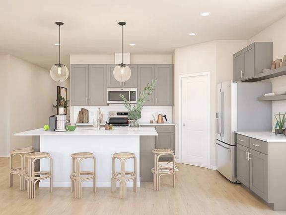 Kitchen with pendant lighting and floating shelves