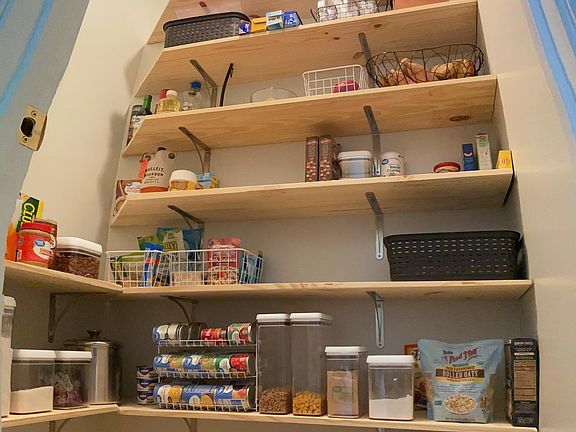 We'll be continuing the shelves up on the left. Also, new floors and paint.