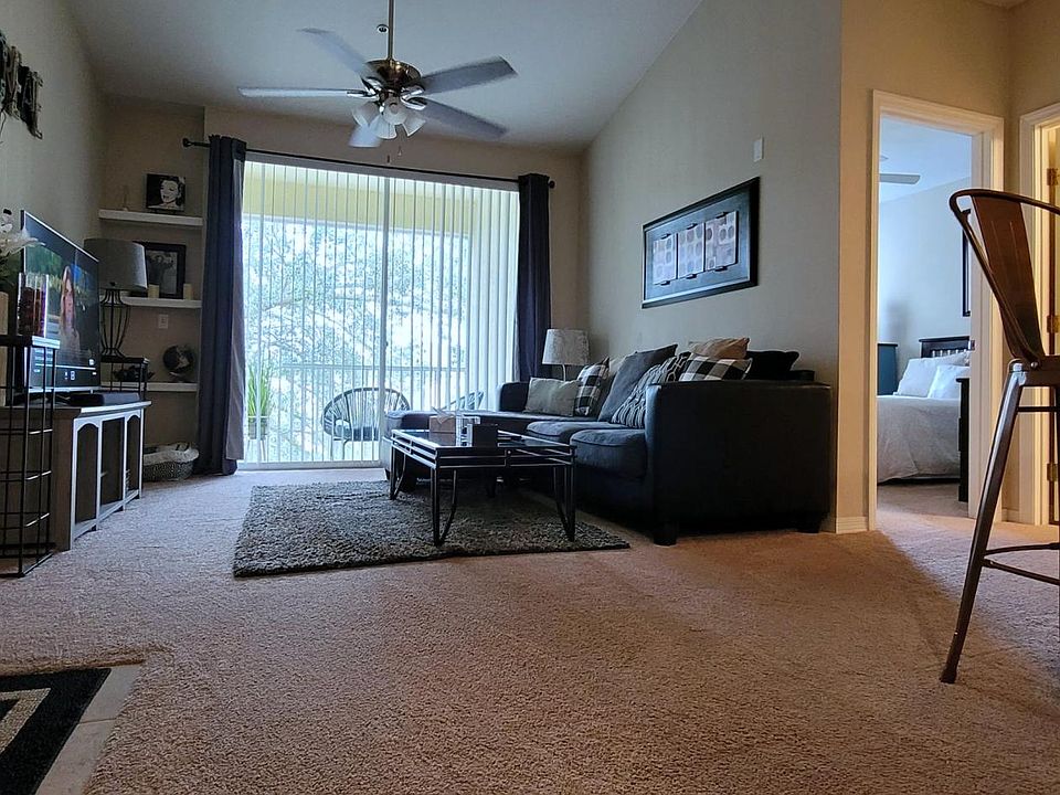 Great room opens to bar counter & dining room