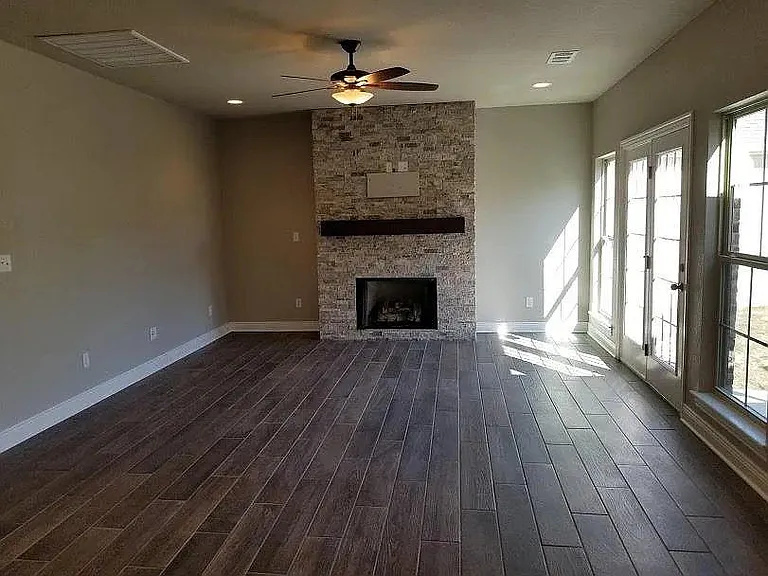 fireplace in the Great Room, french doors to the right open to the patio
