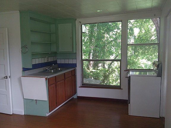 View from large livnig room into tree canopy