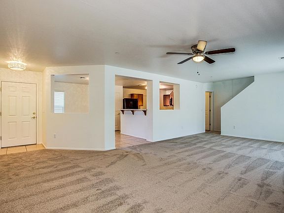 Open eat in kitchen area & breakfast bar. Powder room is located downstairs for your guests.