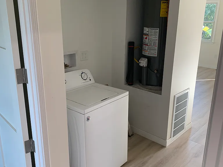 laundry area, washer and dryer included