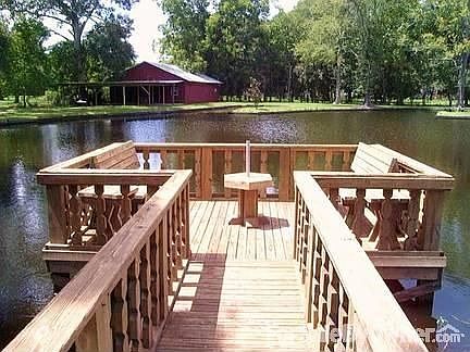 View of pond and workshop from deck