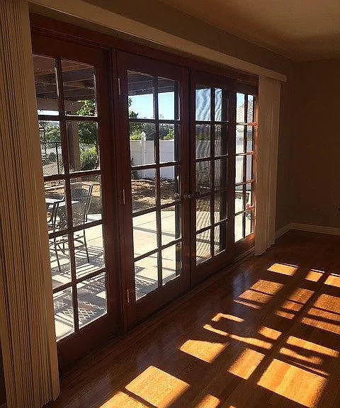 Previous view of patio doors. Recently replaced with new Sliding Doors.