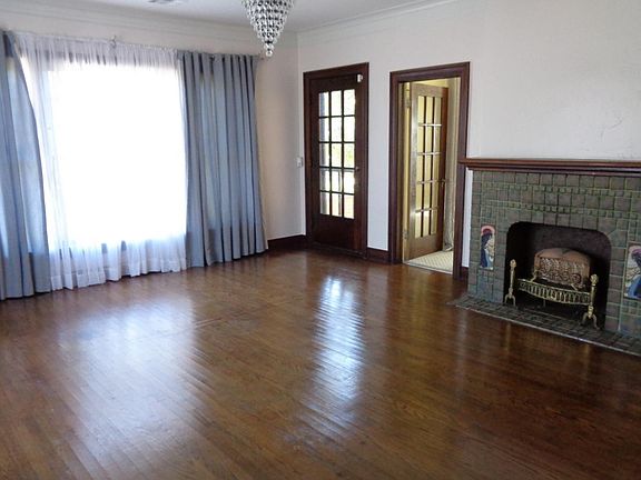 living room with french door leading to balcony