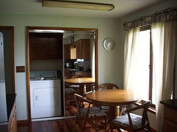 View of dinette area and washer,dryer area