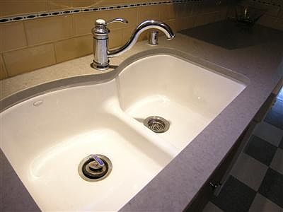 High end fixtures and Caesarstone countertop in the newly remodeled kitchen.