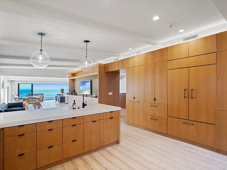 Prepare meals with ocean views and seamless indoor-outdoor flow.