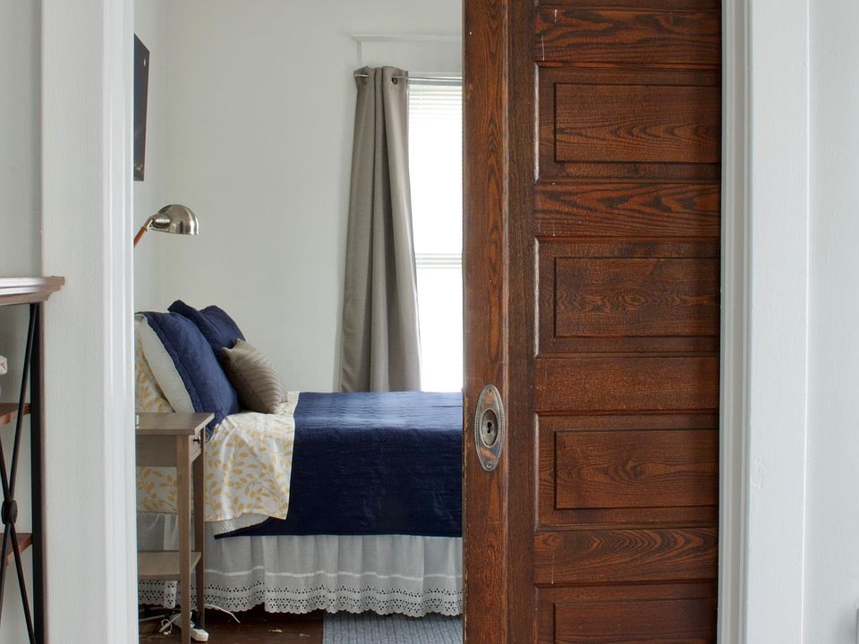 Bedroom has original functioning pocket door!