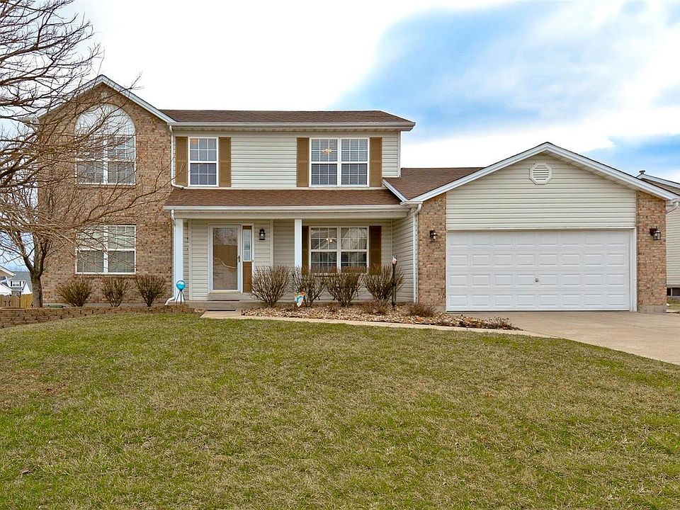 Welcome Home!  The exterior has brick and vinyl with enclosed soffits.