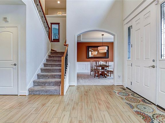 Large living room & dining room just off the bright entry way. 