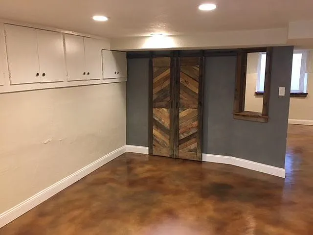Huge eat-in kitchen with wrap around built-in storage cabinets. LED lighting