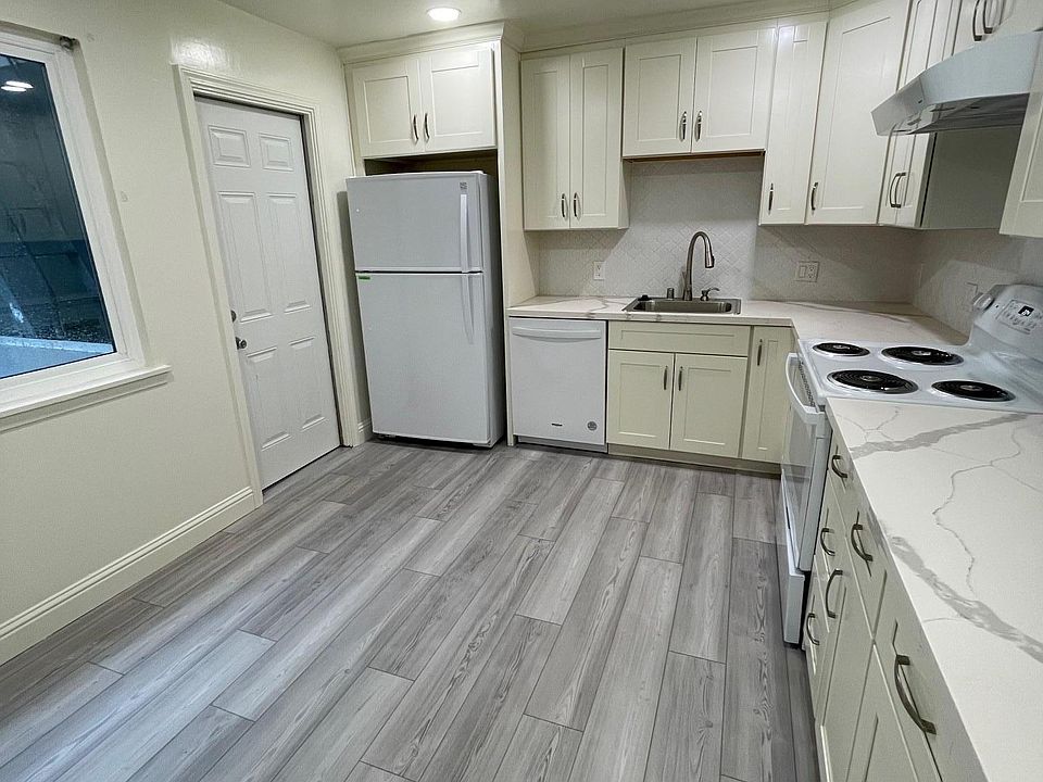 Kitchen with dine in area - all upgraded cabinets, appliances flooring
