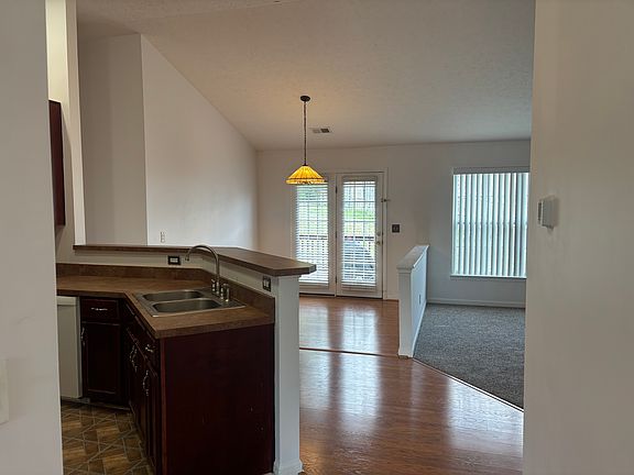 open kitchen with dining and living room