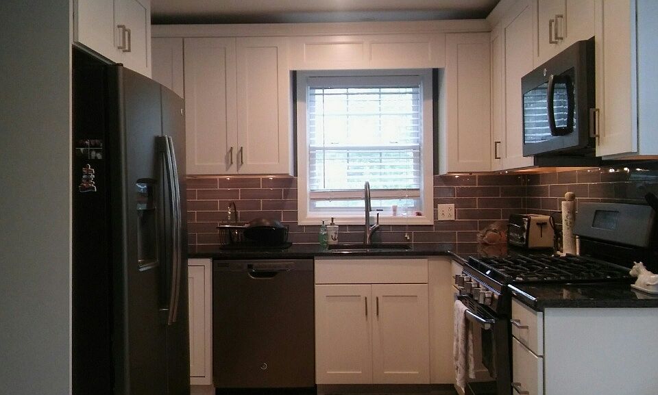 Brand new kitchen with gas stove, dishwasher, side by side f
