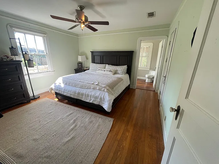 Master bedroom with attached bathroom.