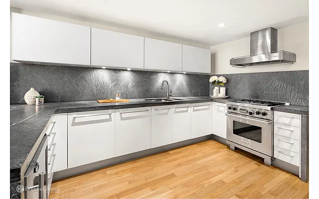 Sold by Douglas Elliman | media 18