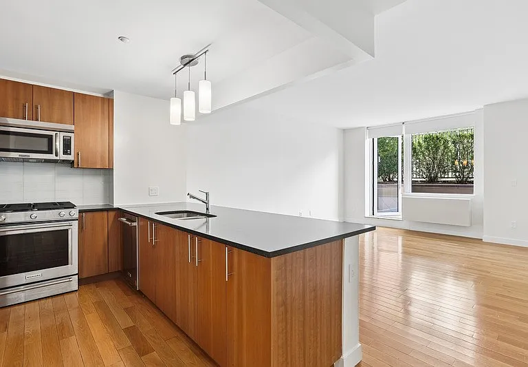 Step into modern elegance at Arbor with this sleek kitchen featuring high-end finishes and spacious layout. Natural light fills the open-concept living area, perfect for entertaining. Schedule your tour today to see it all for yourself!