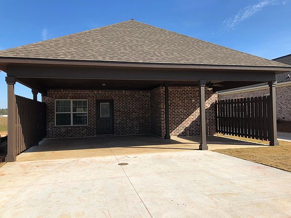 Rear Carport with Patio Space