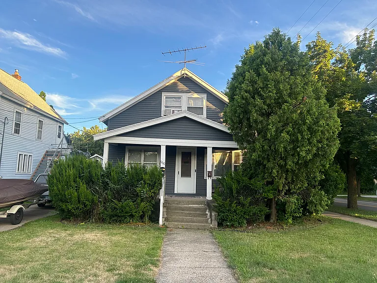 Unit 1 entrance and front yard