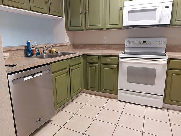 View of kitchen with new dishwasher.