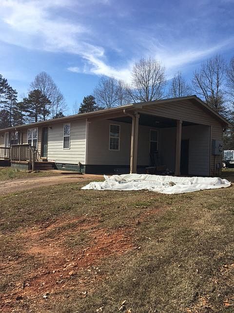 Duplex with covered parking and storage