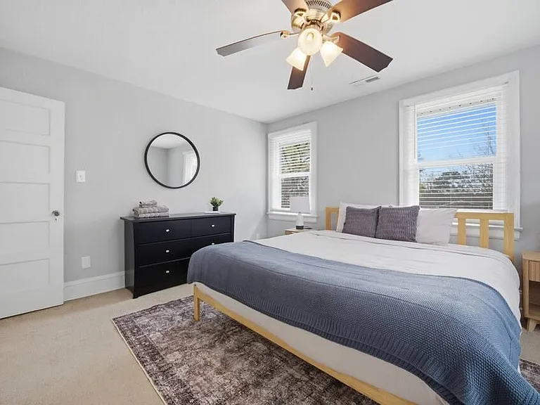Bedroom 3: Plenty of storage and light in this room with a queen size bed.