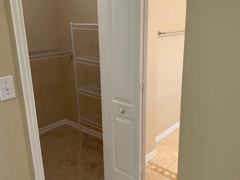 Second of 2 or he/she walk in closet