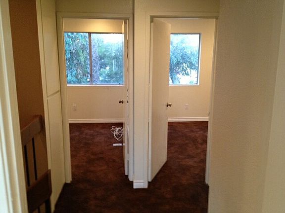 2 Smaller bedrooms side by side for the kids or one can be an office