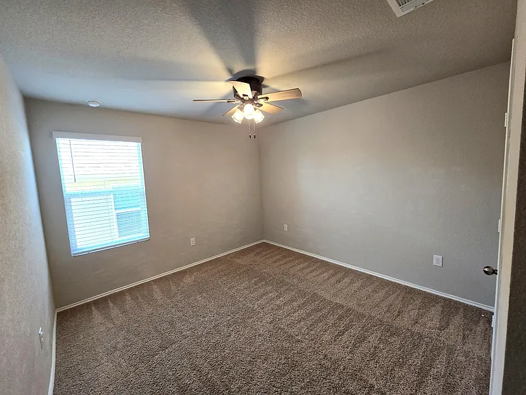 Bedroom 4: Bright bedroom with flexible use for children, guests, roommates or homeschool setup.