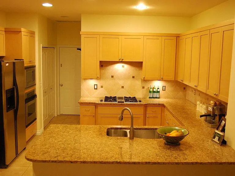 Open kitchen with granite slabs