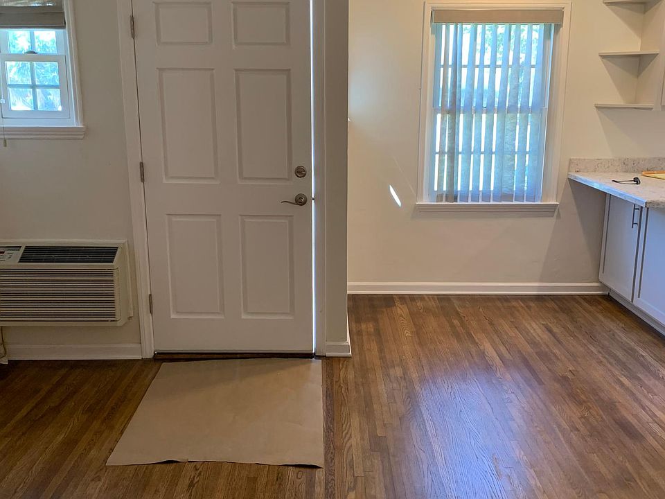 Front door taken from bedroom hallway